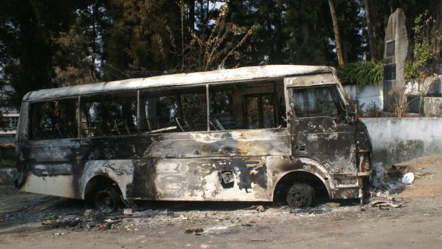 A bus torched in protests by Naga tribesmen over the election, due on February 1 but postponed.