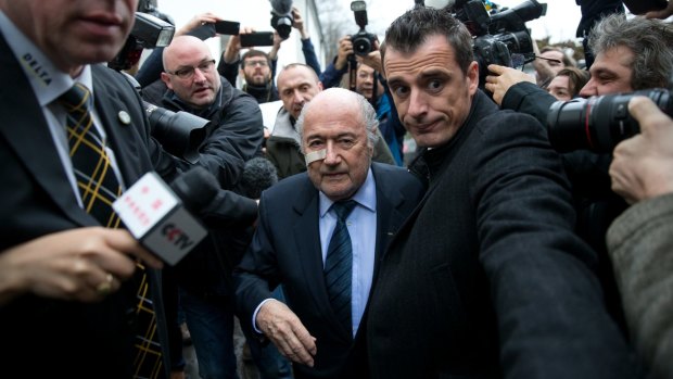 It's not over yet: FIFA president Sepp Blatter arrives for a press conference where he vowed to fight his eight-year ban.