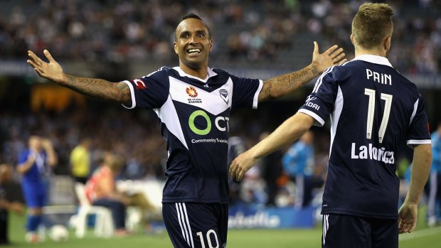 Melbourne Victory veteran Archie Thompson celebrates after scoring one of his three goals.