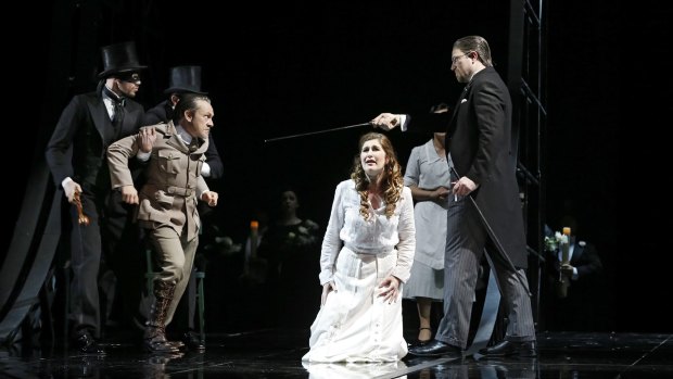Darkly moving: Michael Honeyman (Miller), Nicole Car (Luisa) and David Parkin (Walter) in the Melbourne season of Opera Australia's Luisa Miller.