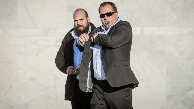 Christopher and Stephen Pattman leave the ACT Supreme Court on Wednesday.
