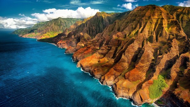 Napali Coast, from the air. There are only three ways of seeing this world-renowned formation. By air, by sea, or by hiking in on tortuously twisting trails.
 