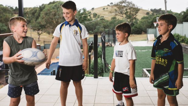 Kai Callaway, 12, at home in Kambah with brothers Jake 10, Ben 7, and Zac 9. 