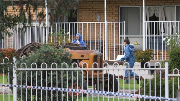 Police at the Cini's home in Badgerys Creek in May, 2014.