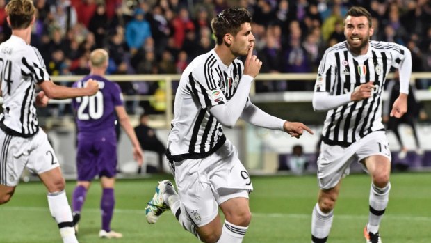 Juventus' forward Alvaro Morata, centre, celebrates after scoring against Fiorentina.