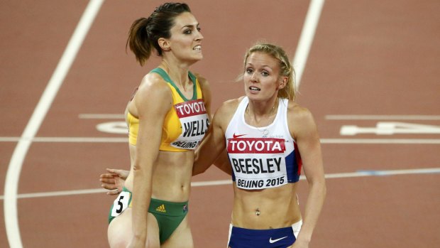Meghan Beesley of the UK and Lauren Wells after competing in the women's 400m hurdles semi-finals.