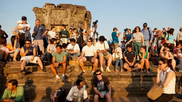 Angkor Wat has limited the number of tourists allowed to watch the sunset from the top of Phnom Bakheng.