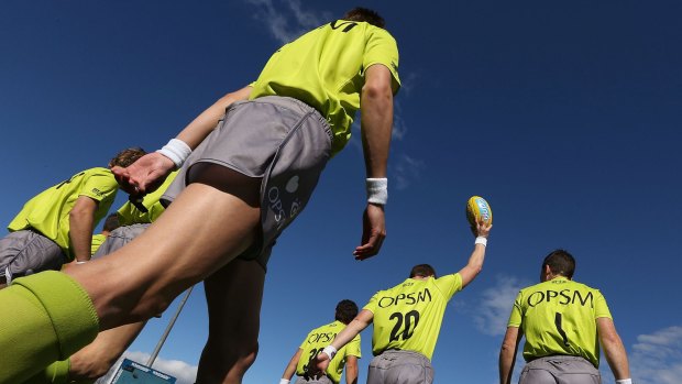 The AFL will trial four umpires officiating a game in the season proper.