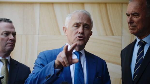 Defence Industry Minister Christopher Pyne, Prime Minister Malcolm Turnbull and Bennelong Liberal candidate John Alexander campaign on Wednesday. 