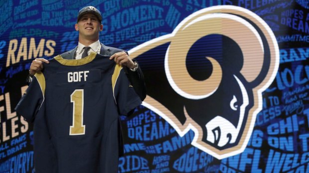 California's Jared Goff poses for photos after being selected by the Los Angeles Rams as the first pick in the first round of the 2016 NFL draft.