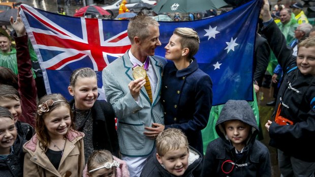 Jared Tallent with his wife Claire at the gold medal presentation ceremony for the 50km Walk for the 2012 London Olympic.