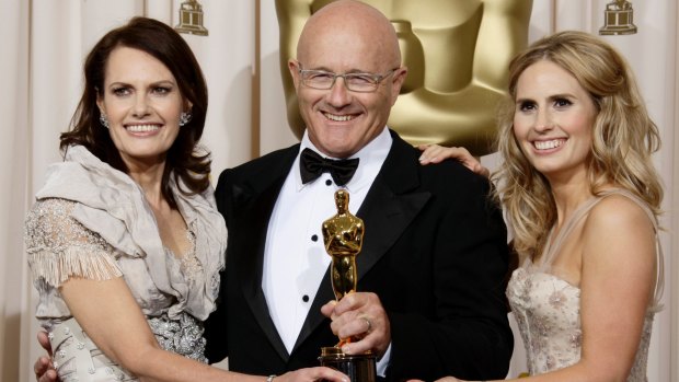 Heath Ledger's mother Sally Bell, father Kim Ledger, and sister Kate Ledger with Heath's posthumous Oscar for best supporting actor in 2009.