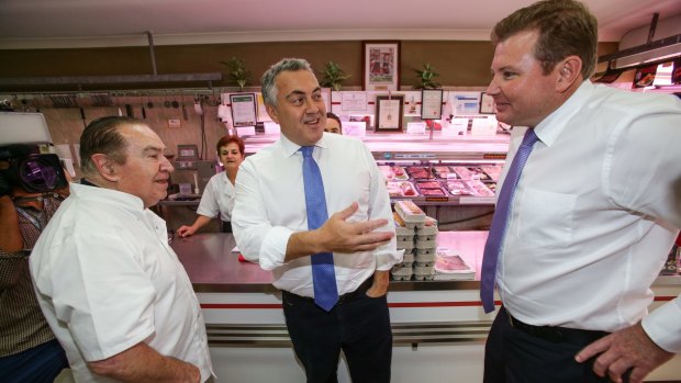 Treasurer Joe Hockey with business owner Giovanni De Romanis and local federal MP Craig at Five Dock Meat Markets on Saturday.