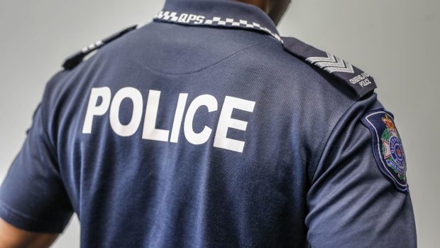 A Queensland cop has been stood down after being charged with breaching a domestic violence order.
