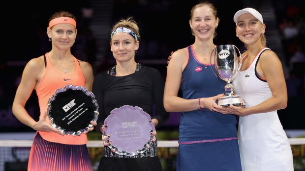On the double: Champions Ekaterina Makarova (2nd right) and Elena Vesnina (right) of Russia pose with Bethanie Mattek-Sands (2nd left) of the United States and Lucie Safarova (left) of Czech Republic after the WTA doubles final.