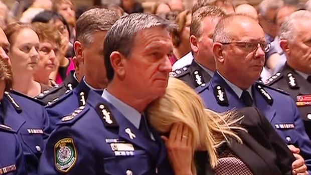 Police Commissioner Andrew Scipione with his wife Joy at a memorial service for the victims of the siege in Martin Place.