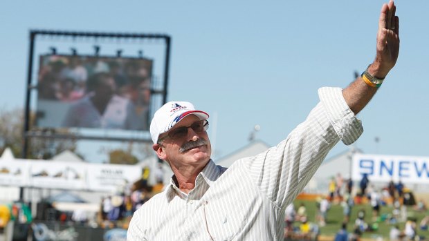 Final farewell: Former Australian fast bowling champion Dennis Lillee does a lap of honour at the WACA in December, 2009.