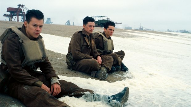 Harry Styles, Aneurin Barnard and Fionn Whitehead in a scene from Dunkirk.