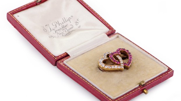 A Russian ruby and diamond brooch.
