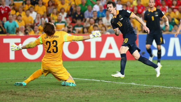 Robbie Kruse of the Socceroos takes a shot at goal during the match against South Korea.