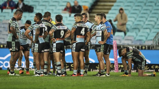 Not over yet ... the Sharks after their loss to the Rabbitohs on Monday night.