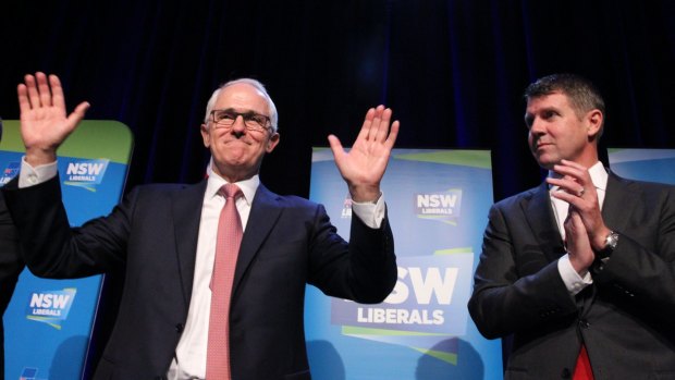 Prime Minister Malcolm Turnbull and Premier Mike Baird at the NSW Liberal Party State Council meeting. 
