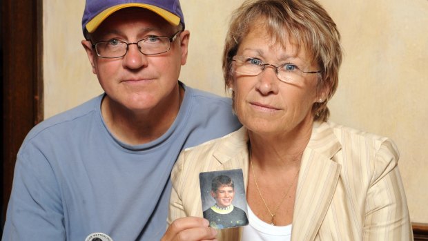 Patty and Jerry Wetterling show a photo of their son Jacob Wetterling, in 1998.