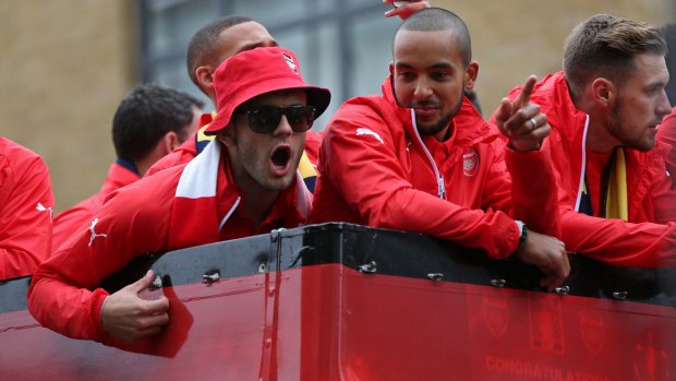 Arsenal's Jack Wilshere enjoys the FA Cup parade.