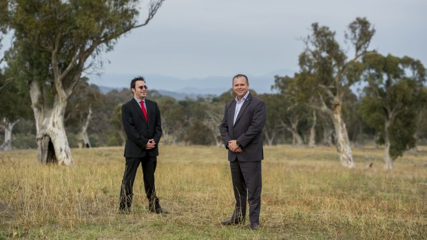 ACT Shelter boss Travis Gilbert and CSIRO general manager for business and infrastructure services Mark Wallis at the CSIRO Ginninderra Field Station site.