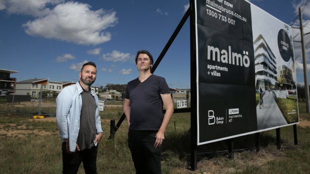From left, developer/creative director Nik Bulum and architect Nathan Judd in front of the site of the future Malmo apartment and commercial development near the intersection of Ginninderra Drive and Braybrooke Street in Bruce.  