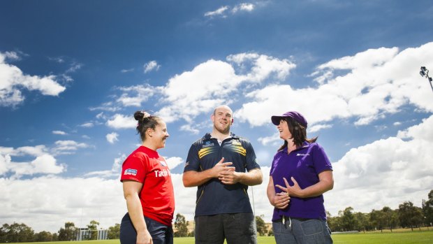Raising awareness: Brain cancer survivor Sarah Mamalai (wearing purple) with Wallaroo Louise Burrows and Wallaby captain and Brumby Stephen Moore ahead of the Walk4Brain Cancer event on Sunday.  