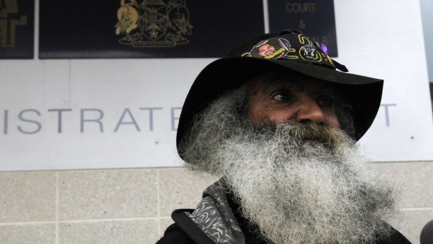 Adrian Charles Davis, 63, speaks outside the ACT Magistrates Court on Monday.