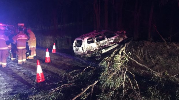 The elderly man was rescued from the burning car near Blackbutt.
