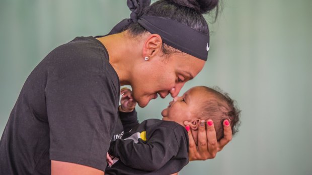 Canberra Capitals recruit Mistie Bass with son Braven Boyd.