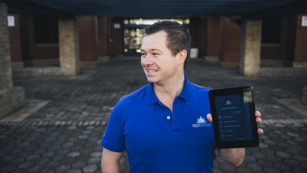 Appsence director David McMillan outside Lake Tuggeranong College, which has used his app for student absences and permissions since February last year.