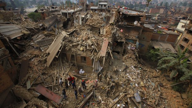 Rescuers at work in the town of  Bhaktapur after April's earthquake.