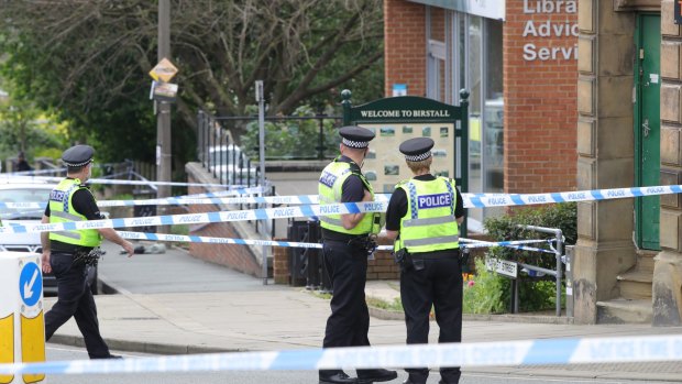 Police cordon off an area after Jo Cox, 41, Labour MP was shot and stabbed by an attacker at her constituency.