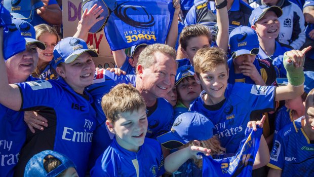 Andrew Forrest joins the crowd during a rally in support of the Western Force.