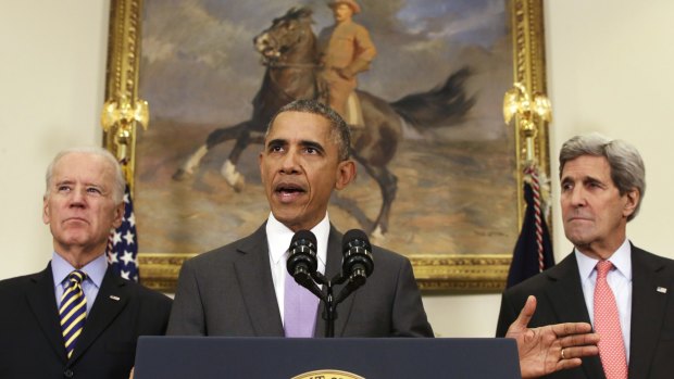 President Barack Obama, flanked by Vice President Joe Biden and Secretary of State John Kerry.