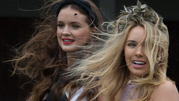 Models are blown away by the Melbourne Cup Carnival launch.