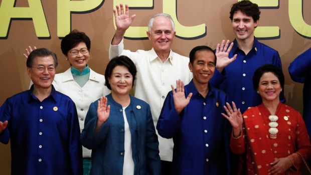 Australian Prime Minister Malcolm Turnbull poses with the leaders of Canada, South Korea, Indonesia and Hong Kong during the APEC summit.