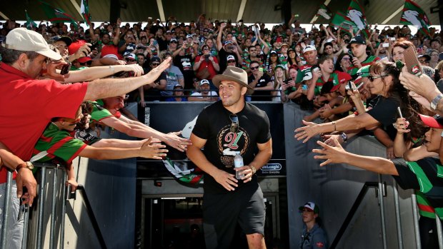 Supporters show their support for Sam Burgess at the South Sydney Rabbitohs fan day at Redfern Oval.