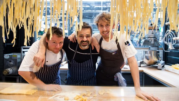 Chef Eugenio Maiale (centre) of Flour Eggs Water by A Tavola at home in the refurbished Harold Park Tramsheds.  