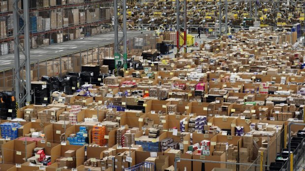 Parcels are processed and prepared for dispatch at an Amazon fulfilment centre in Peterborough, England, in the lead-up to Christmas,