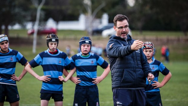 New Brumbies head coach Dan Mackellar trains the Canberra Grammar School U14 rugby team. 