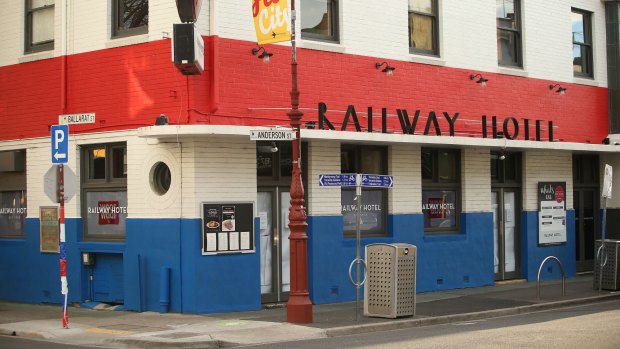 The Railway Hotel in Yarraville, where the doors and windows were covered in white paper on Monday.