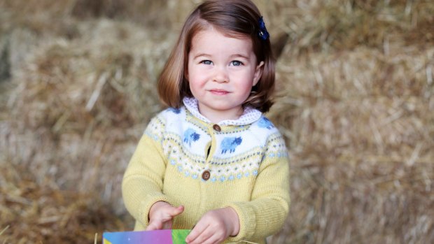 Princess Charlotte appears to be thrilled at the prospect of her impending second birthday in this new photo taken by her mother, the Duchess of Cambridge. 