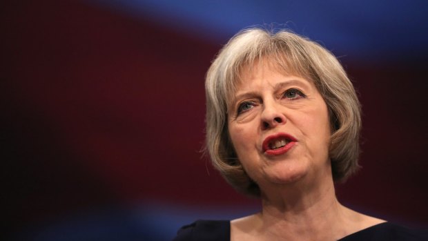 British Home Secretary Theresa May delivers her keynote speech to delegates during the Conservative Party conference on Tuesday.