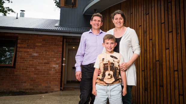 Michael Dobbie and Ruth Arkell, with daughter Sophia have recycled  their old home by maximising the amount of material reused from their old house. 