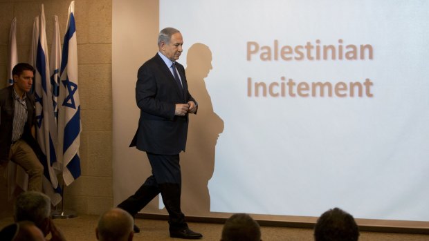 Israeli Prime Minister Benjamin Netanyahu walks during a press conference at the Foreign Ministry in Jerusalem on Thursday.